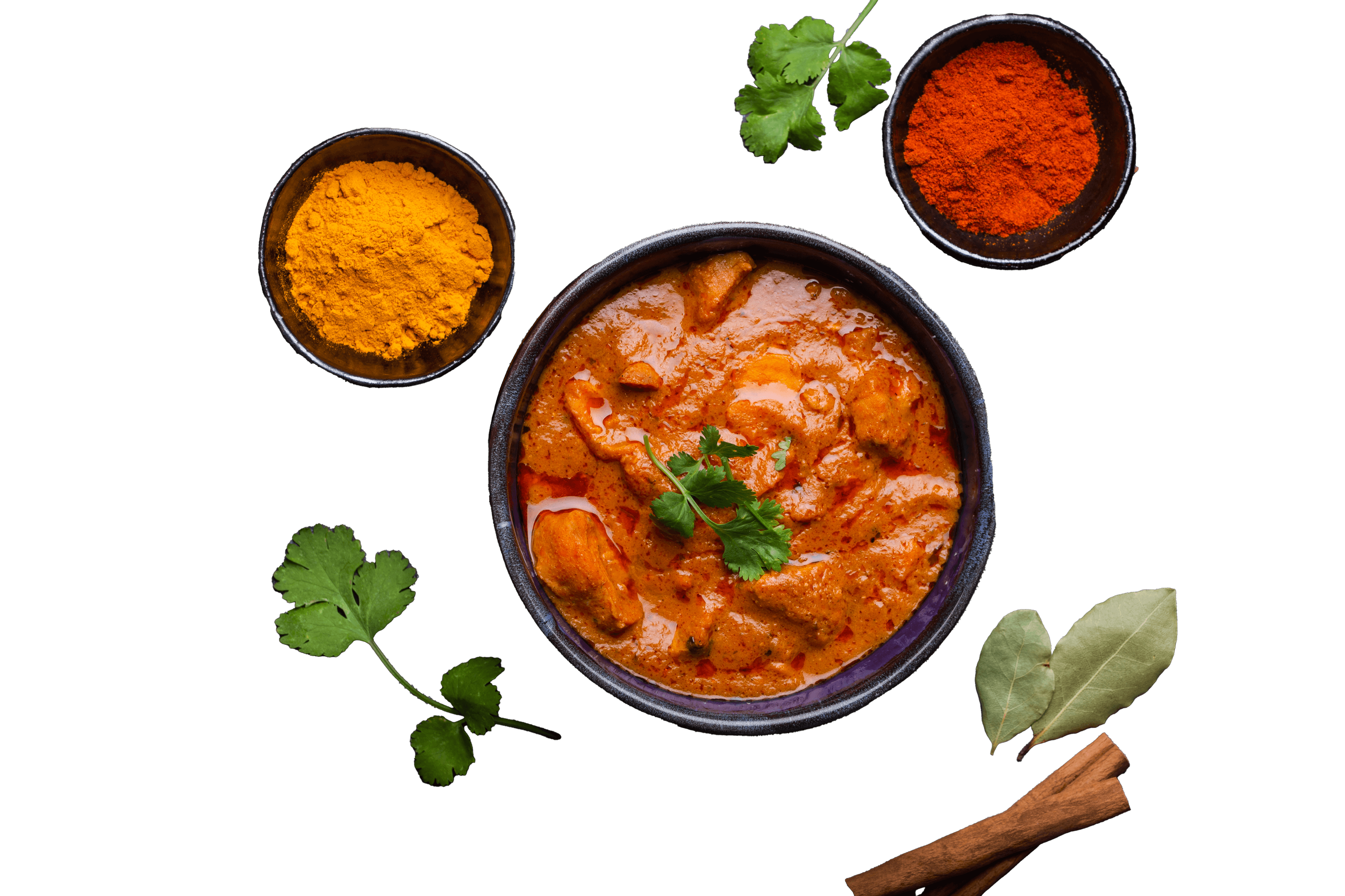 Delicious curry bowl surrounded by spices